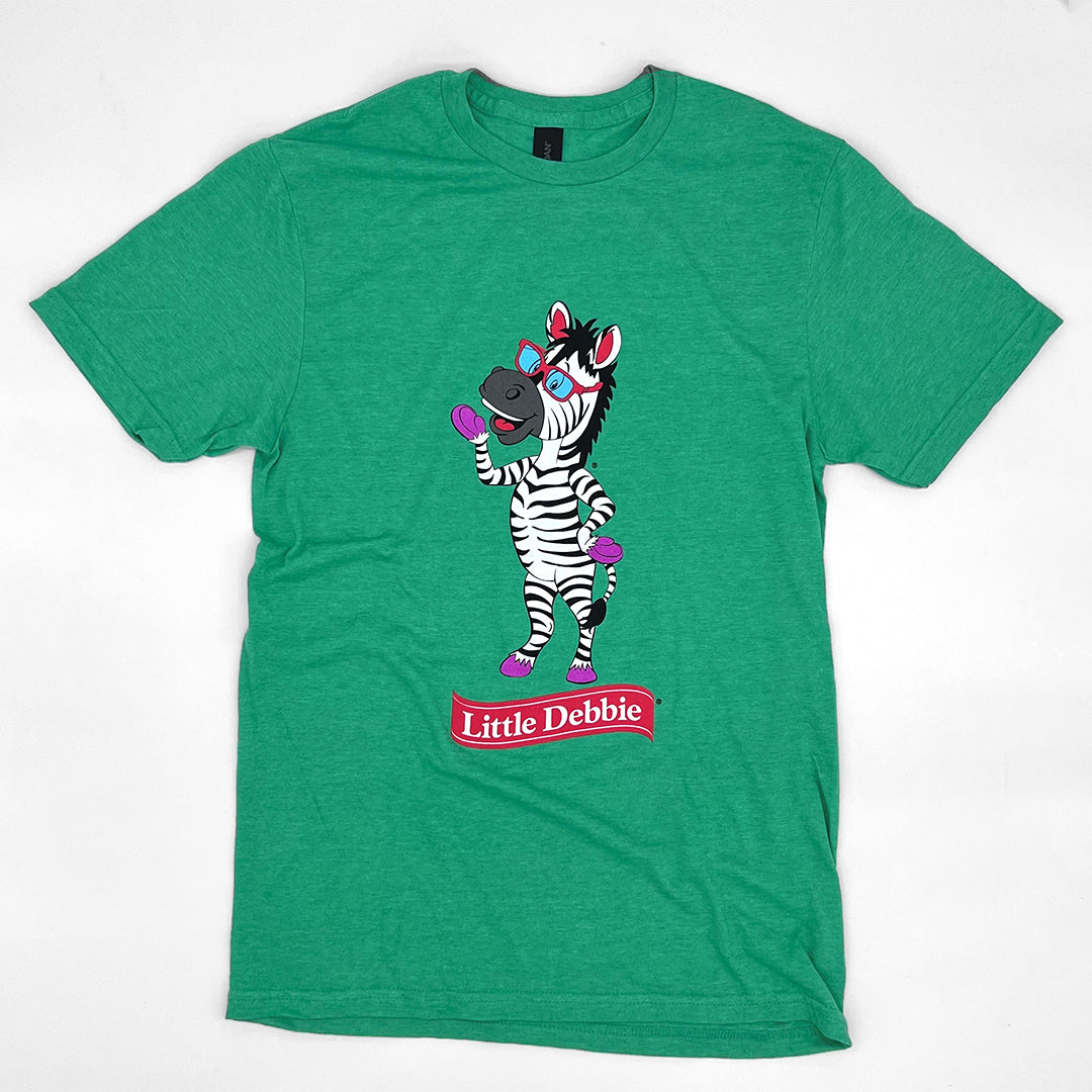 Front view of a green Little Debbie T-shirt featuring a full body image of Zain the Zebra™  waving, positioned above the Little Debbie Ribbon logo.
