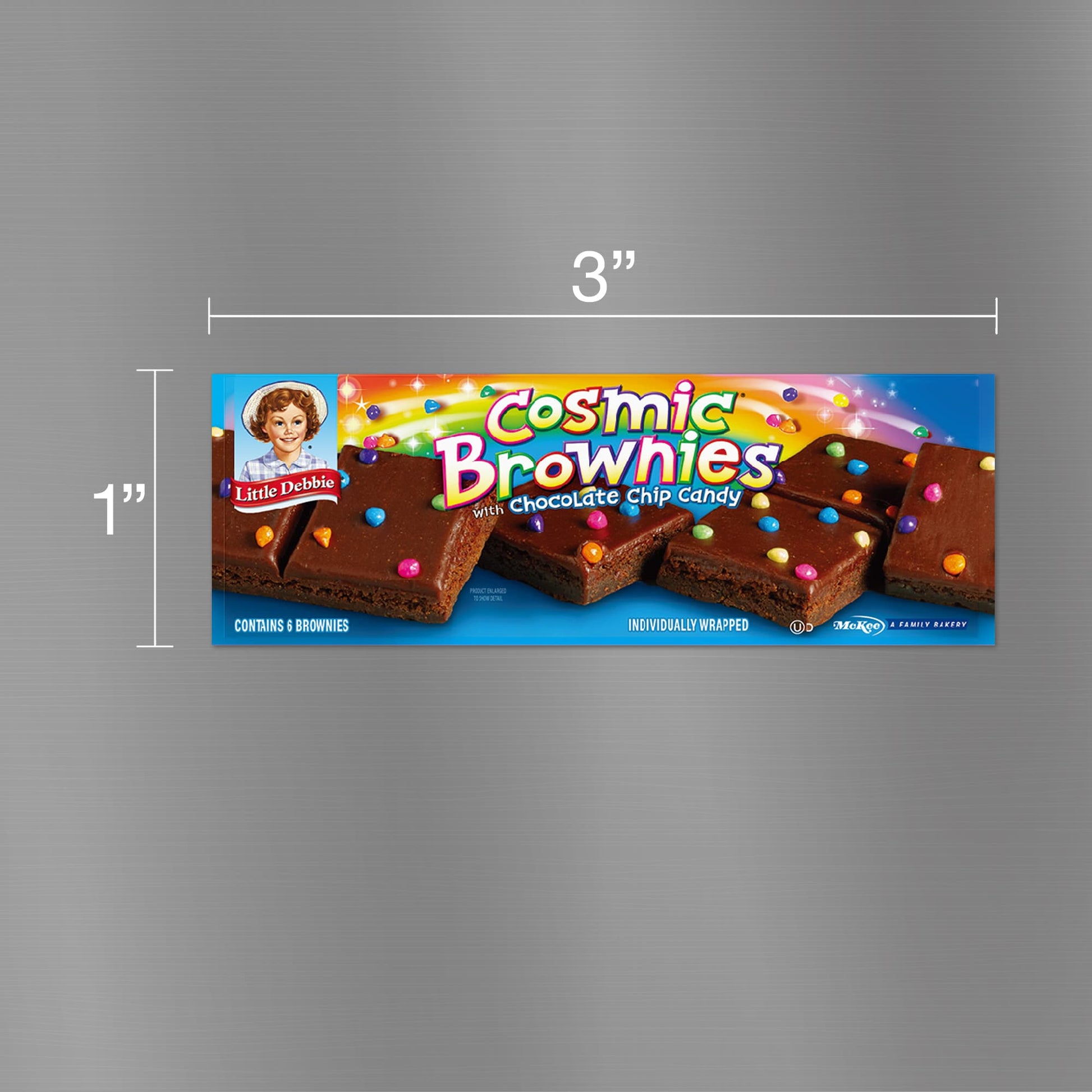 Image of a Little Debbie Cosmic® Brownies carton magnet, measuring 3 inches wide and 1 inch tall. The magnet features a colorful design with the Little Debbie logo, images of square brownies topped with rainbow-colored chocolate chip candies, and the vibrant 'Cosmic® Brownies with Chocolate Chip Candy' text. The background of the carton is adorned with bright, multicolored lights, creating a festive, cosmic effect.