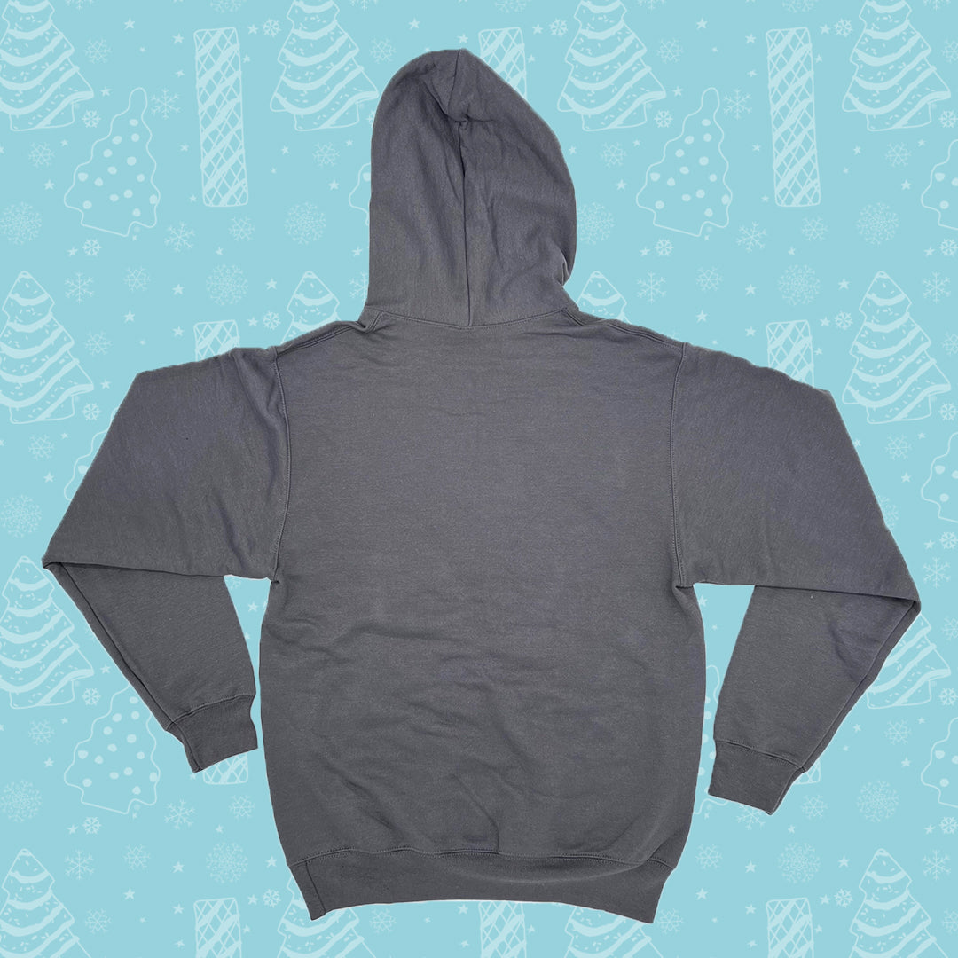 Back view of a gray hoodie displayed on a white background. The hoodie is shown with the hood up, and has long sleeves with ribbed cuffs. The back of the hoodie is plain without any visible designs or text. It's set against a light blue background patterned with white illustrations of Christmas Trees Cakes, Christmas Tree Brownies, snowflakes, and other winter motifs.