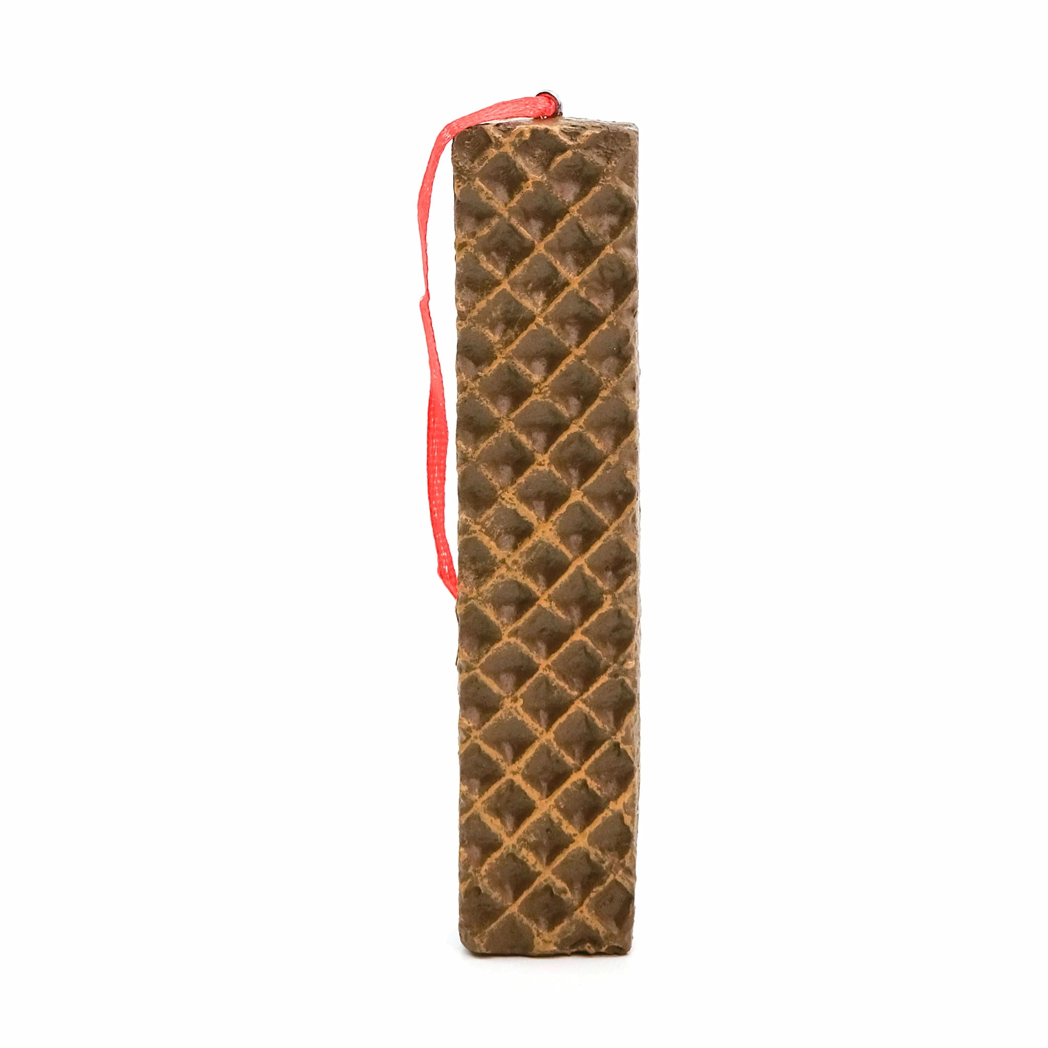 Little Debbie Nutty Buddy Ornament shown upright against a white background, featuring a textured wafer design with a red hanging ribbon attached at the top.