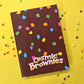 Little Debbie® Cosmic® Brownies Journal front on yellow background.
